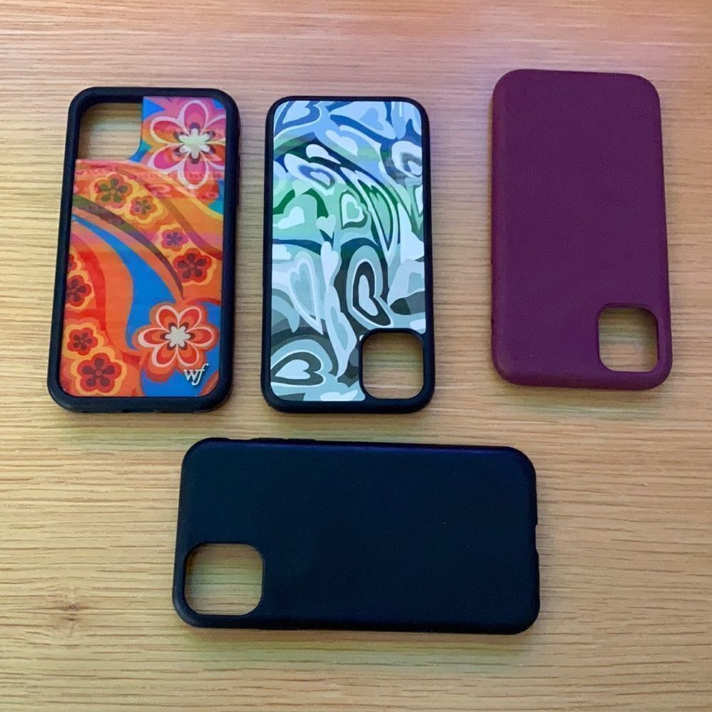 Various IPhone 11 cases including wallflower case